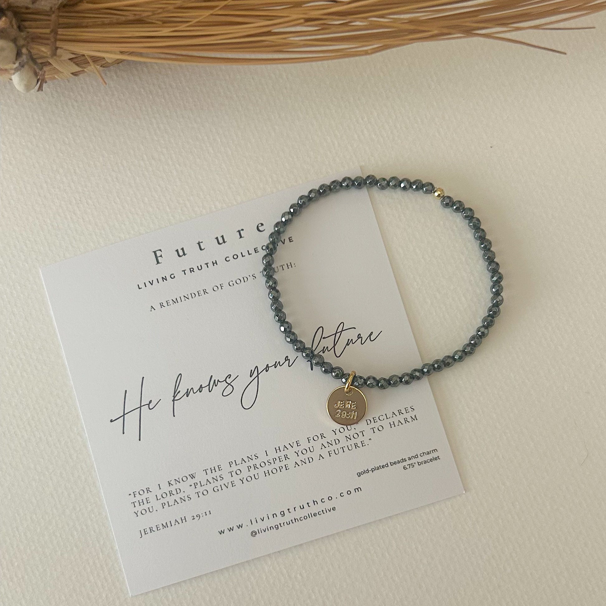 Handmade bracelet with 'God Knows Your Future' scripture card