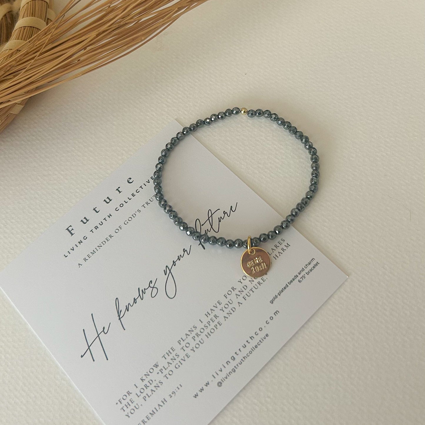 Gold-plated bead bracelet with faith-inspired charm